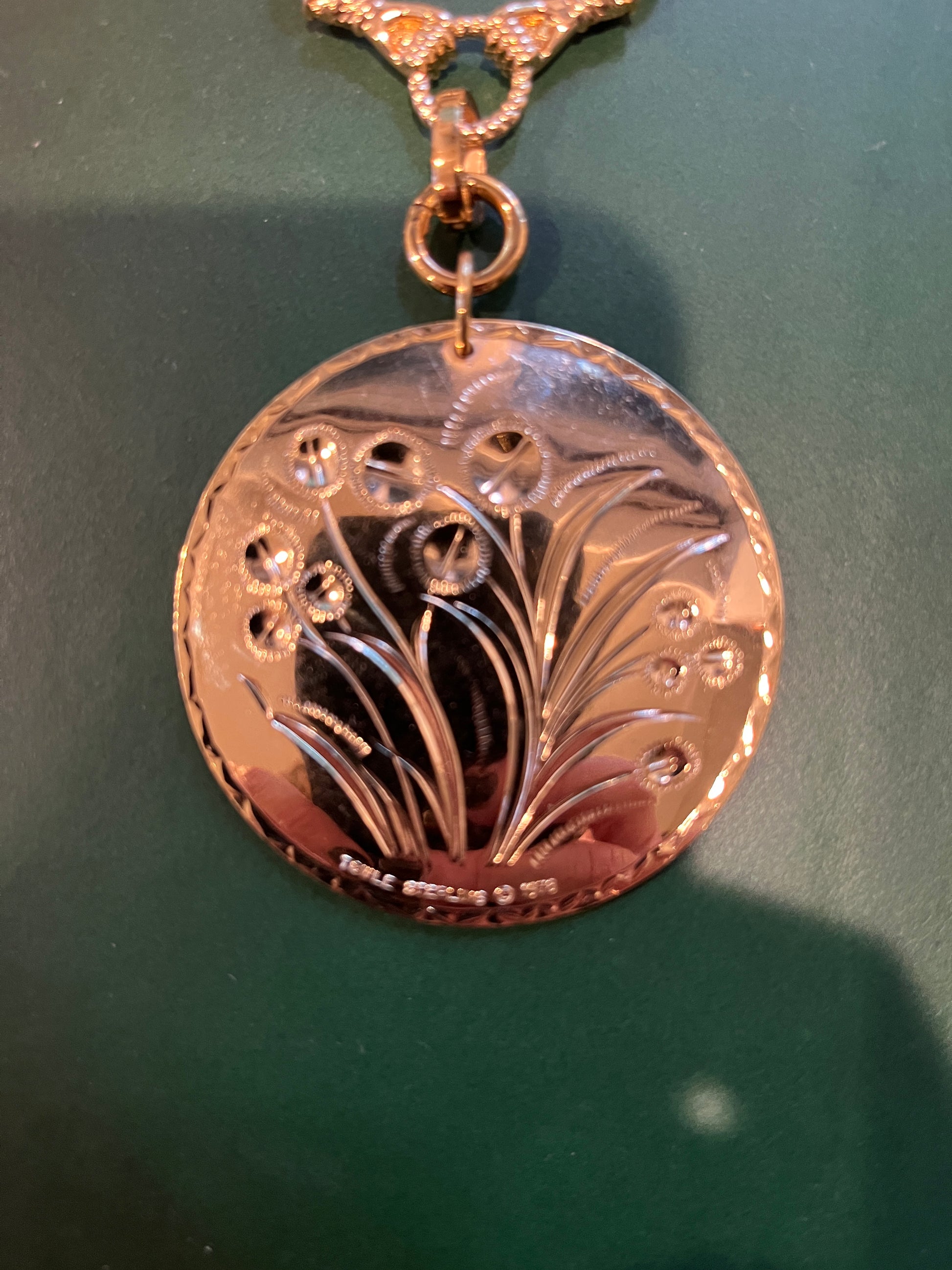 Double sided floral pendant