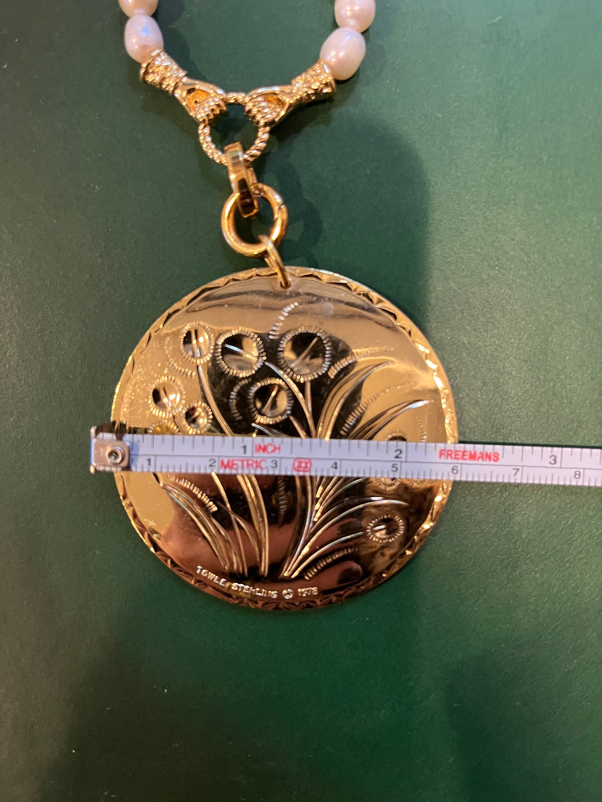 Double sided floral pendant