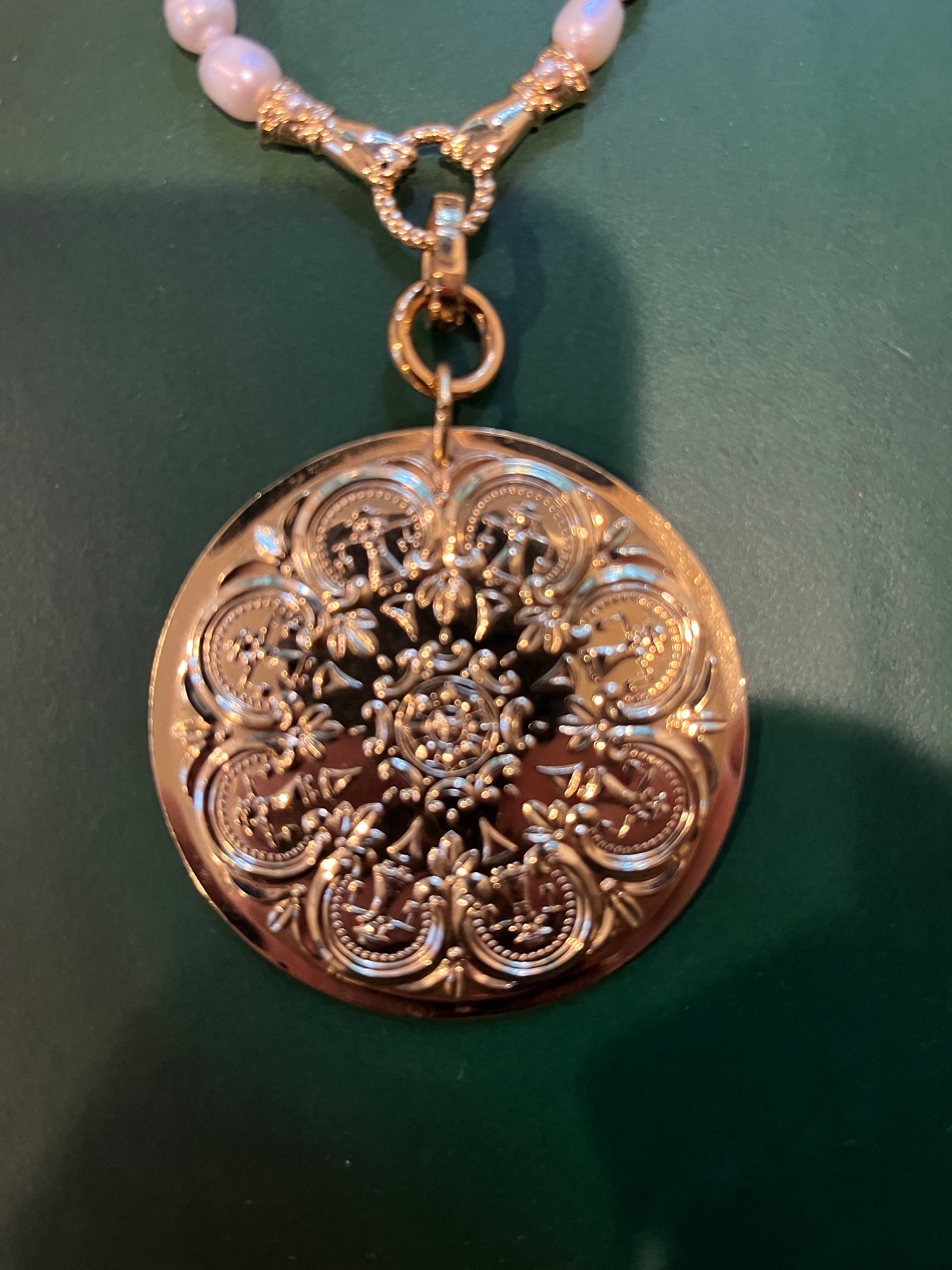 Double sided floral pendant