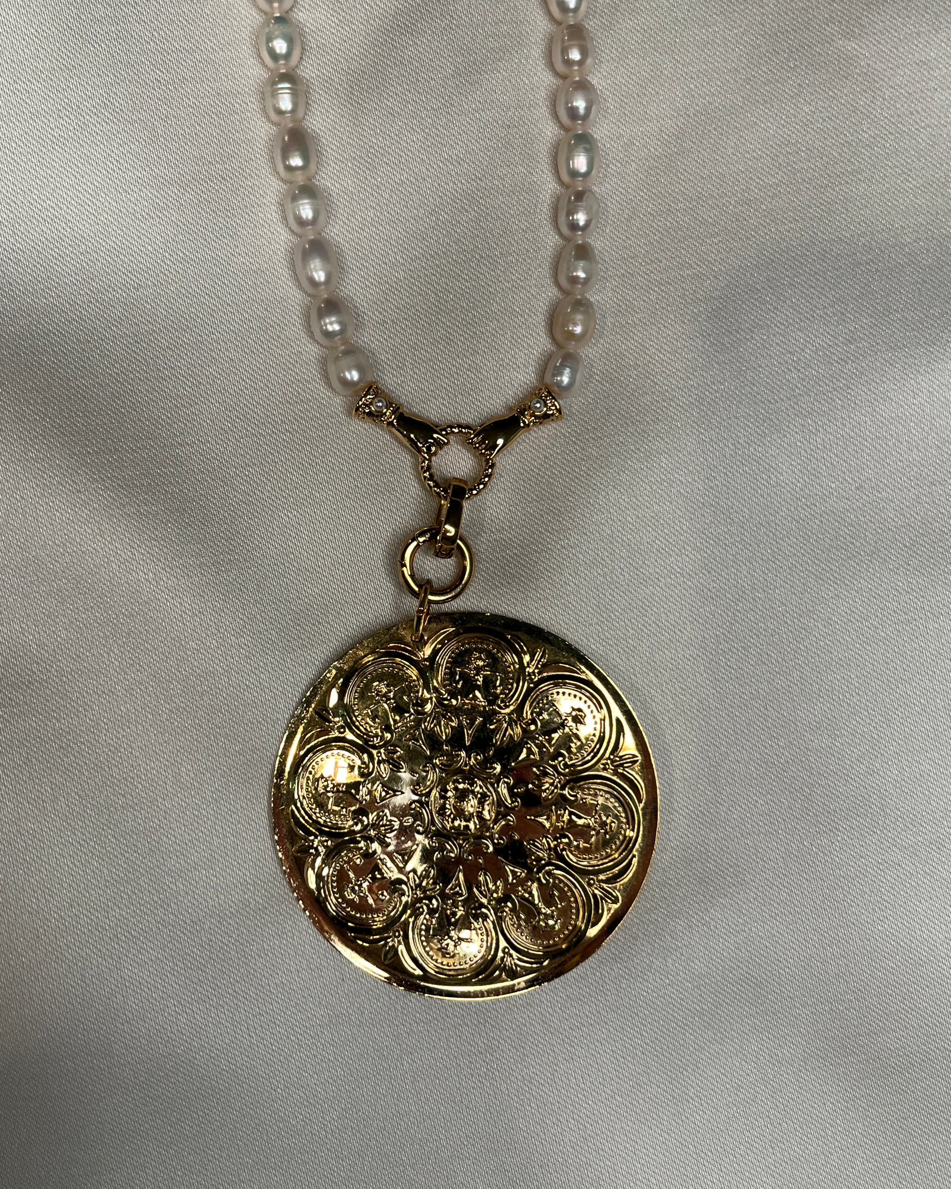 Double sided floral pendant