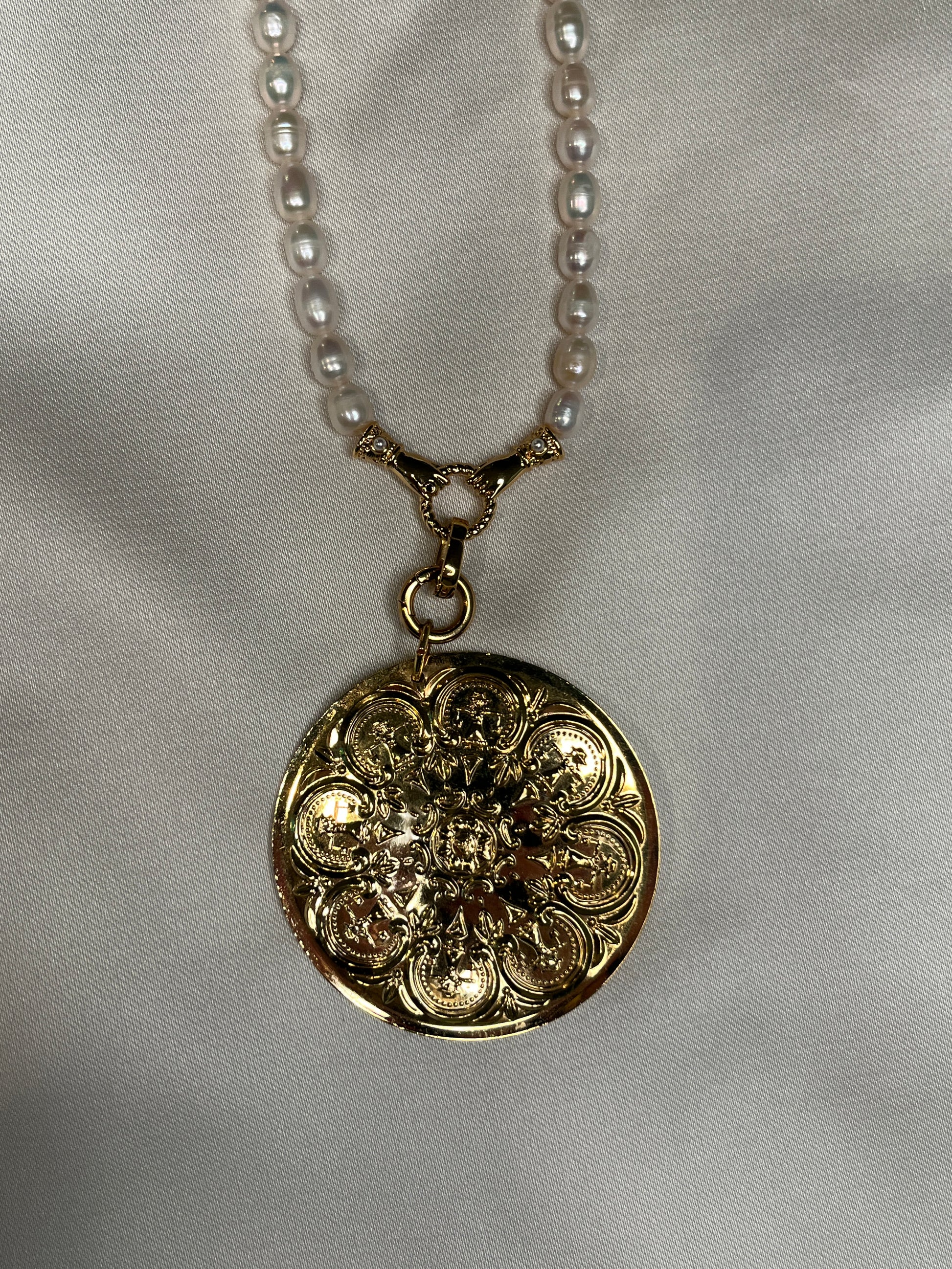 Double sided floral pendant